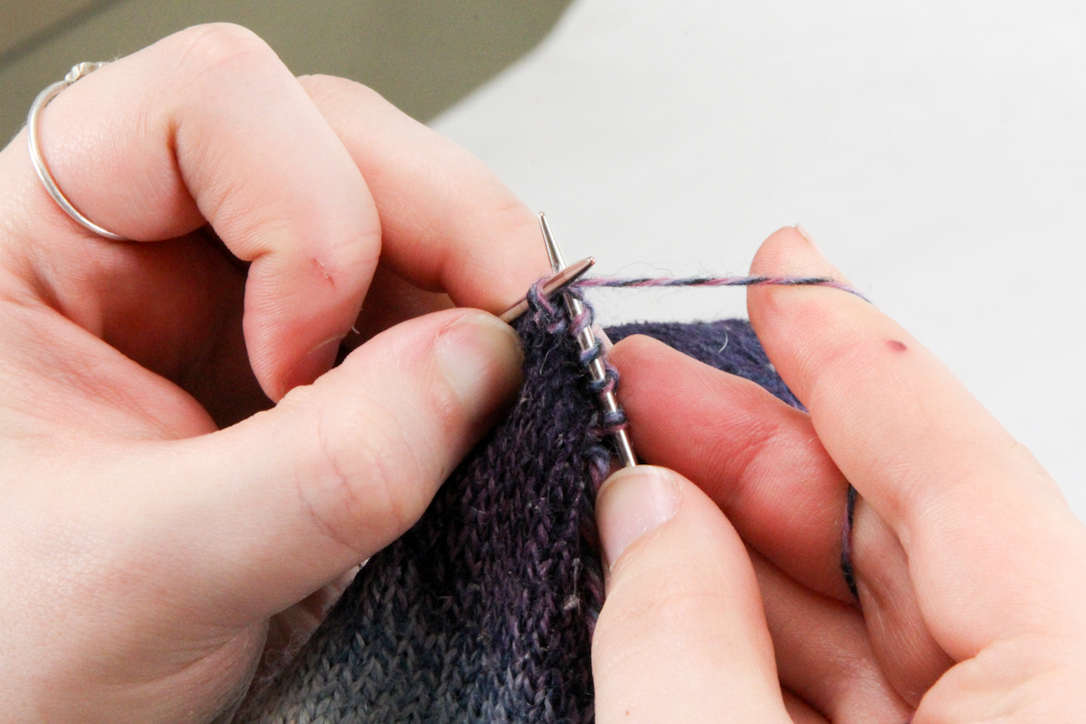 Darning socks by hand