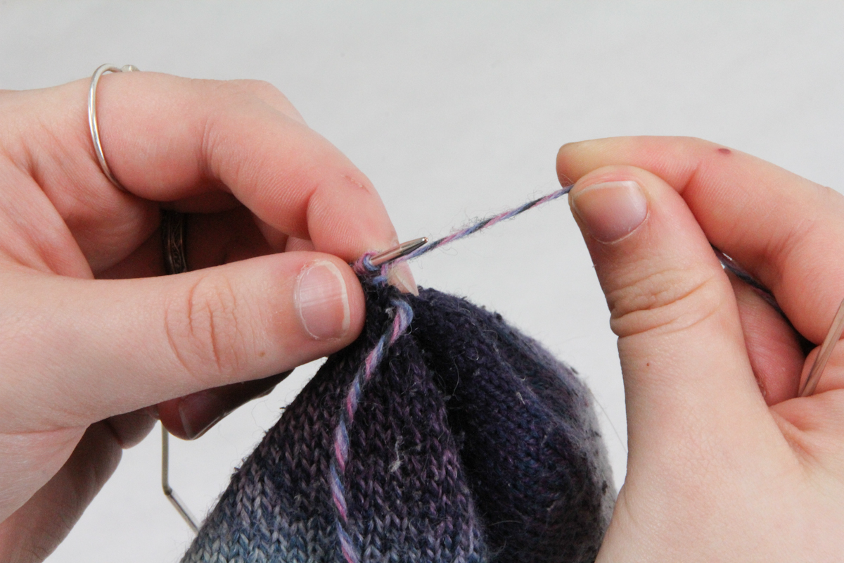 Trying out a darning mushroom for the first time on my hand-knit socks,  makes all the difference! : r/Visiblemending